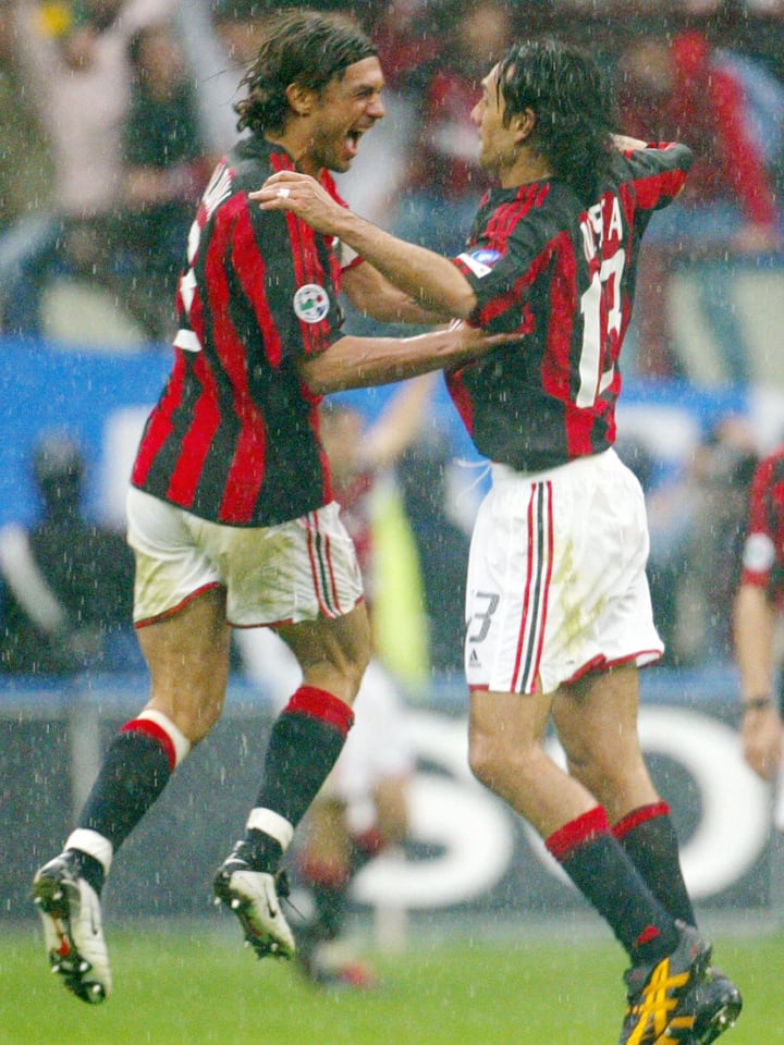 AC Milan's captain Paolo Maldini (L) jub